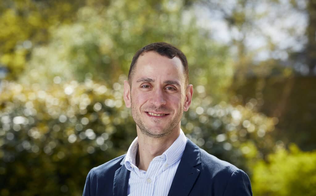 Clean professional portrait of a man outdoors, representing the European detergent industry.